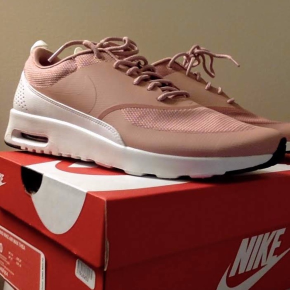 nike thea rust pink